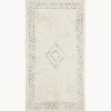 Alfombra artesanal de algodón con flecos Flonn