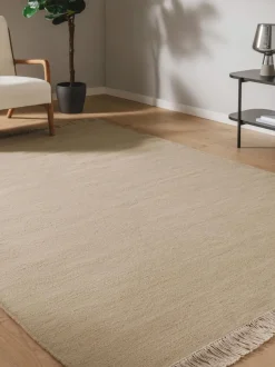 Alfombra artesanal de lana con flecos Liv