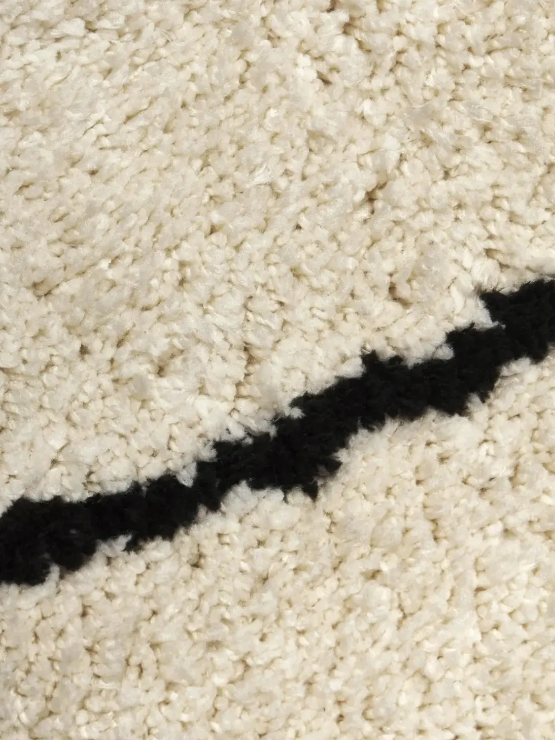 Alfombra redonda artesanal de pelo largo Naima