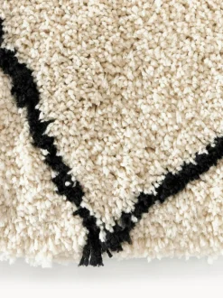Alfombra redonda artesanal de pelo largo Naima