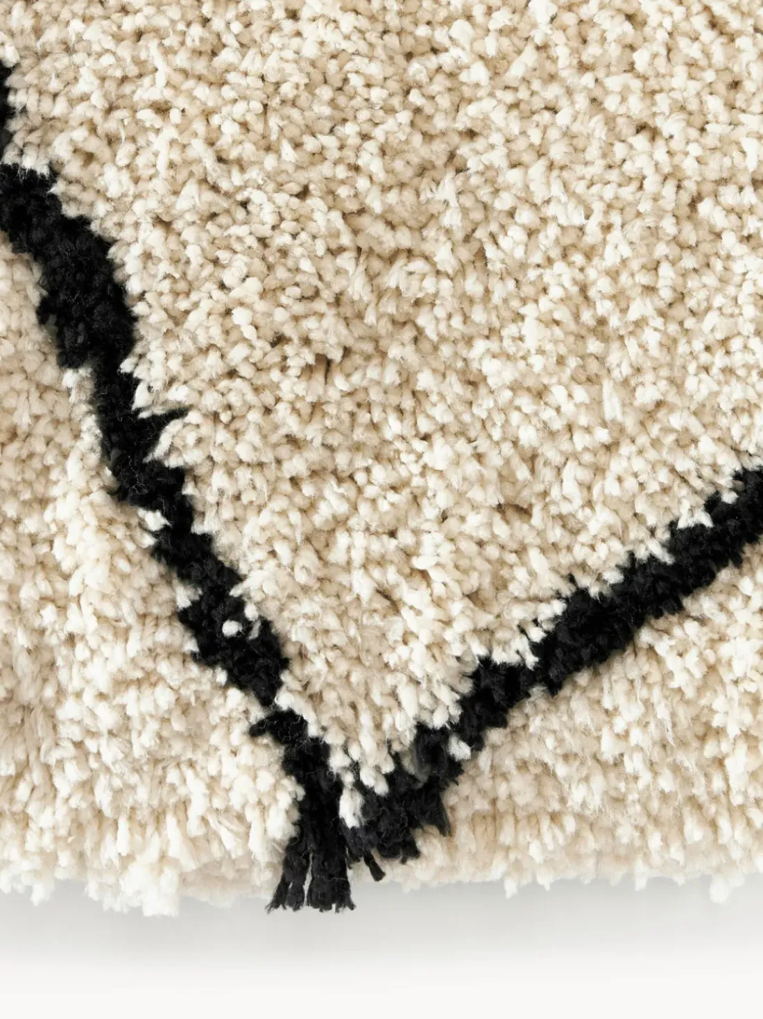 Alfombra redonda artesanal de pelo largo Naima