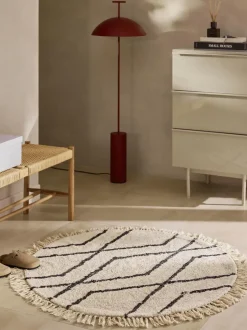 Alfombra redonda artesanal de algodón con diseño de rombos Bina