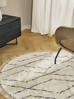 Alfombra redonda artesanal de algodón con diseño de rombos Bina
