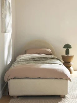 Cama individualde borreguillo Ebba, con espacio de almacenamiento