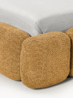 Cama individual tapizada en borreguillo bouclé con espacio de almacenamiento Tayla