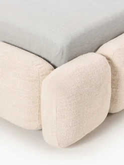 Cama individual tapizada en borreguillo bouclé con espacio de almacenamiento Tayla