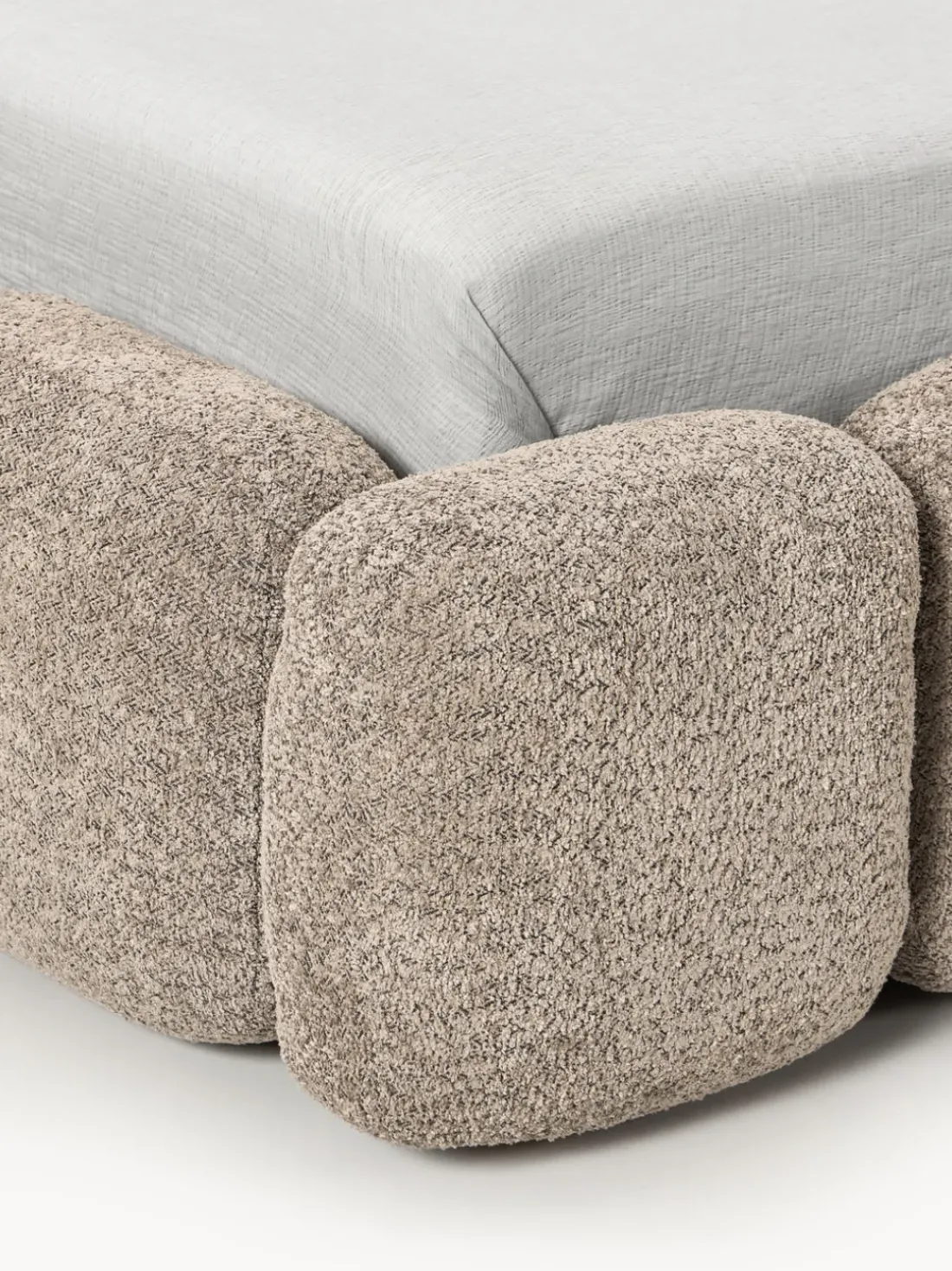 Cama individual tapizada en borreguillo bouclé con espacio de almacenamiento Tayla