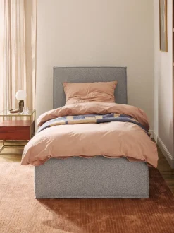 Cama individual tapizada en tejido bouclé Dream