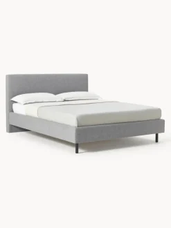 Cama tapizada con patas de madera Giulia