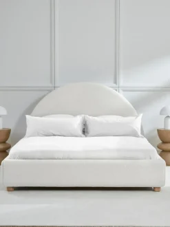 Cama tapizada en borreguillo Ebba, con espacio de almacenamiento