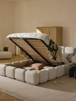 Cama tapizada en tejido bouclé con espacio de almacenamiento Tayla
