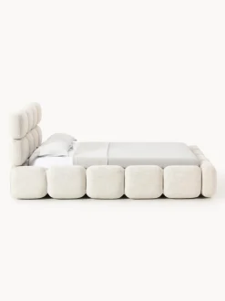 Cama tapizada en tejido bouclé con espacio de almacenamiento Tayla
