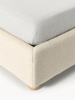 Cama tapizada en tejido bouclé Ebba, con espacio de almacenamiento