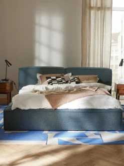 Cama tapizada en tejido bouclé Lennon, con espacio de almacenamiento
