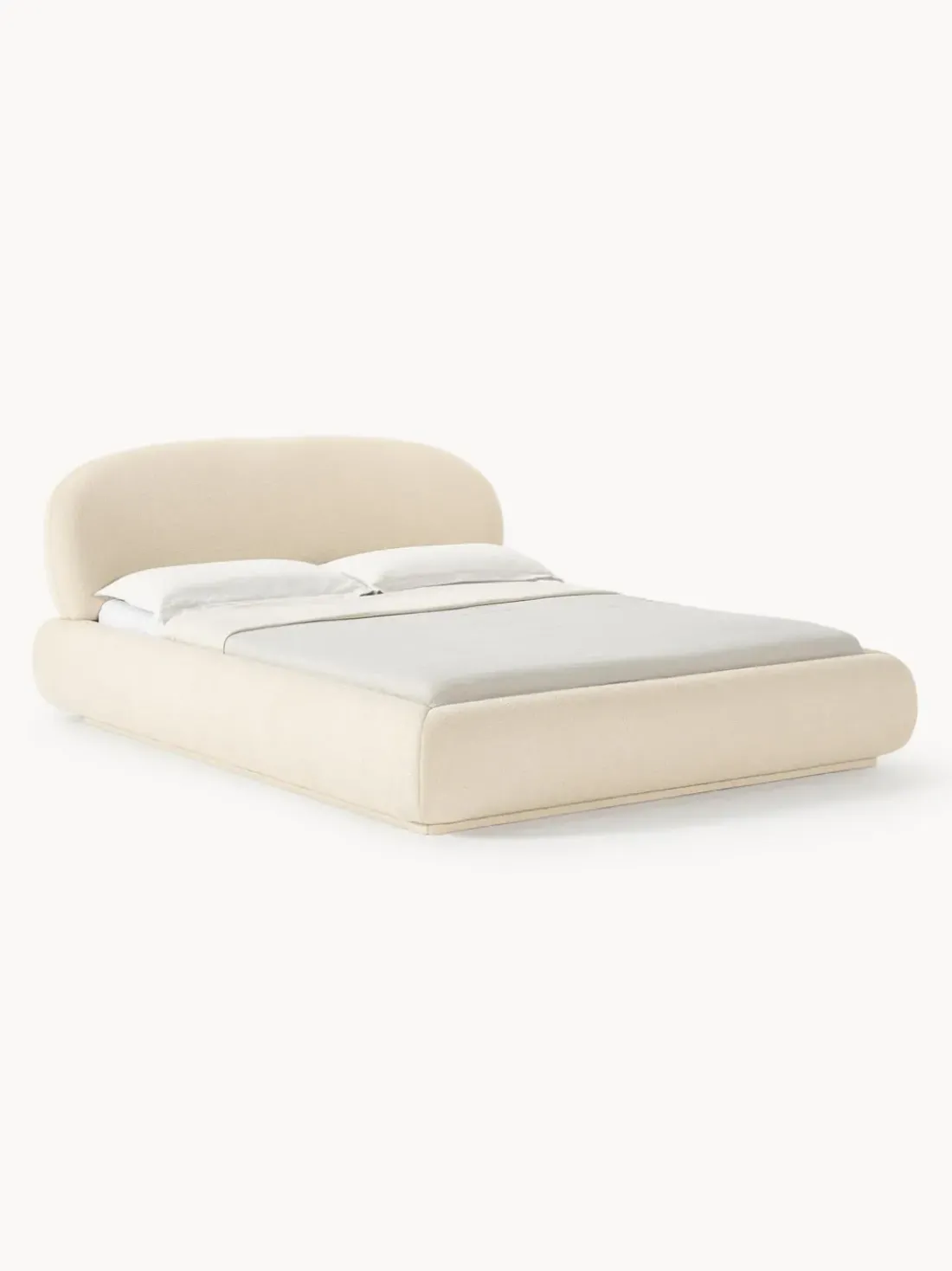 Cama tapizada redondeada en tejido bouclé Alba
