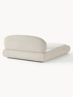 Cama tapizada redondeada en tejido bouclé Alba