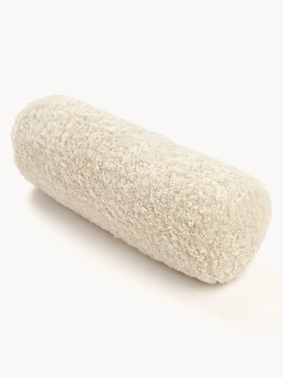 Cojín rulo de borreguillo Dotty