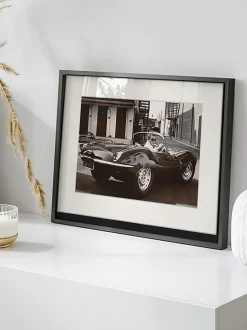 Fotografía enmarcada Steve McQueen in his Jaguar