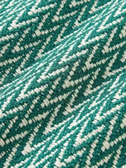 Funda de cojín para exterior con tejido artesanal y flecos Suria
