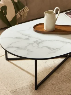 Mesa de centro ovalada con tablero de vidrio en look mármol Antigua