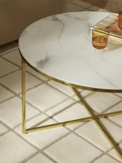 Mesa de centro redonda con tablero de vidrio en look mármol Antigua