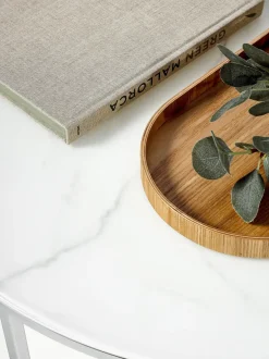 Mesa de centro redonda con tablero de vidrio en look mármol Antigua