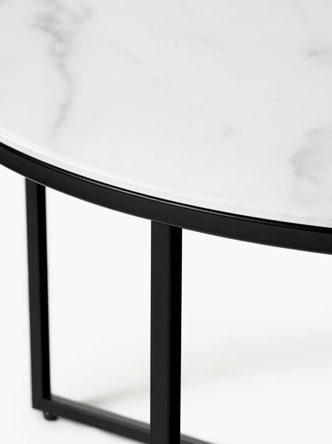 Mesa de centro redonda con tablero de vidrio en look mármol Antigua