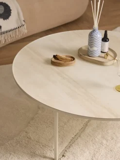 Mesa de centro redonda grande con tablero de vidrio en aspecto mármol Antigua