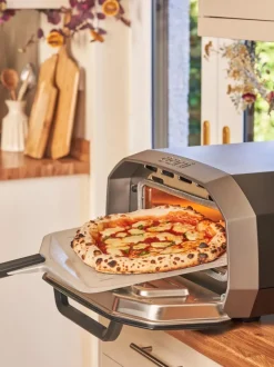 Pelador de pizza de metal Riccardo