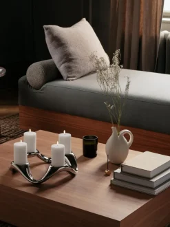Portavela de acero inoxidable con forma orgánica Cobra