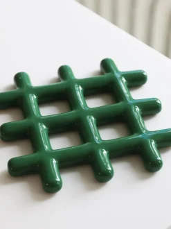Salvamanteles Grid