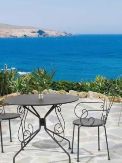 Silla con reposabrazos para exterior apilable Etienne