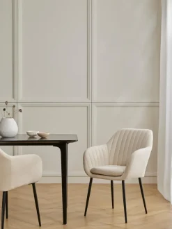 Silla de terciopelo con reposabrazos Emilia