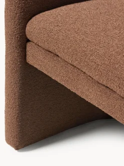 Sillón con reposabrazos en tejido bouclé Mairo