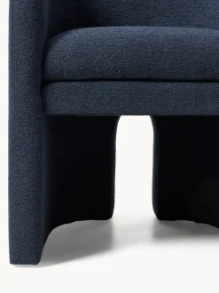 Sillón con reposabrazos en tejido bouclé Mairo
