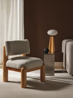 Sillón en tejido bouclé Dalma
