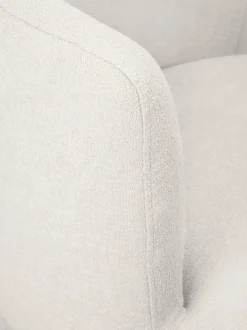 Sillón en tejido bouclé de diseño Solomon