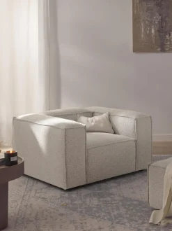 Sillón en tejido bouclé Lennon