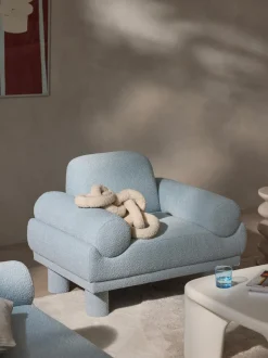 Sillón en tejido bouclé Lilo