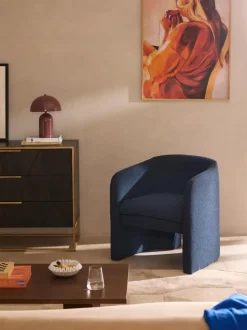Sillón en tejido bouclé Mairo