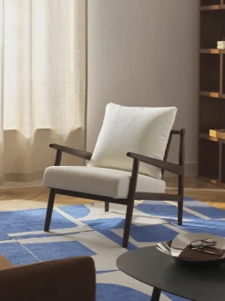 Sillón en tejido bouclé Mikkel