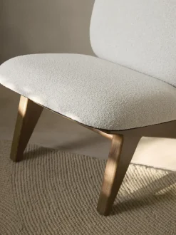 Sillón en tejido bouclé Shenay