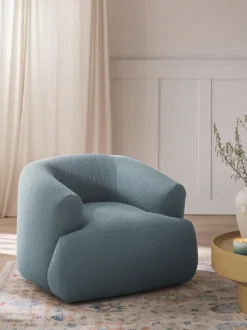 Sillón en tejido bouclé Sofia