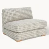 Sillón en tejido bouclé Stories