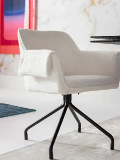 Sillón giratorio en tejido bouclé Bess