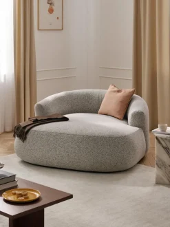 Sillón grande en tejido bouclé Sofia