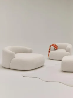 Sillón lounge grande en tejido bouclé Sofia