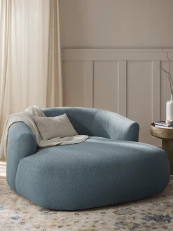 Sillón lounge grande en tejido bouclé Sofia