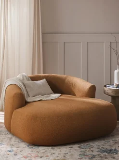 Sillón lounge grande en tejido bouclé Sofia