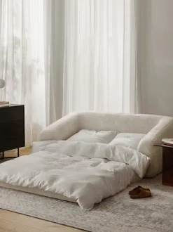 Sofá cama de borreguillo bouclé Eliot (2 plazas)